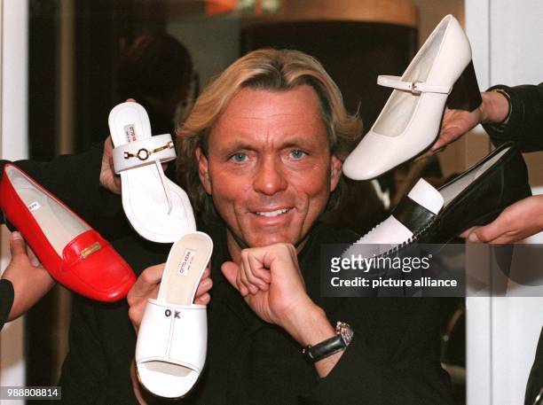 The fashion entrepreneur Otto Kern presents his shoe collection at the International Shoe Fair in Duesseldorf, Germany, 15 September 1996. The...