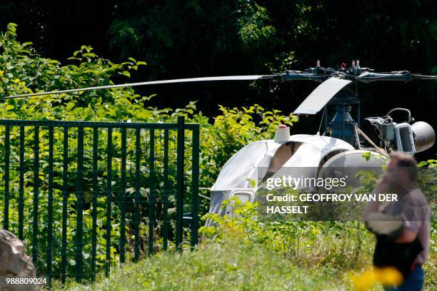 This picture taken on July 1, 2018 in Gonesse, north of Paris shows a French helicopter Alouette II abandoned by French armed robber Redoine Faid...