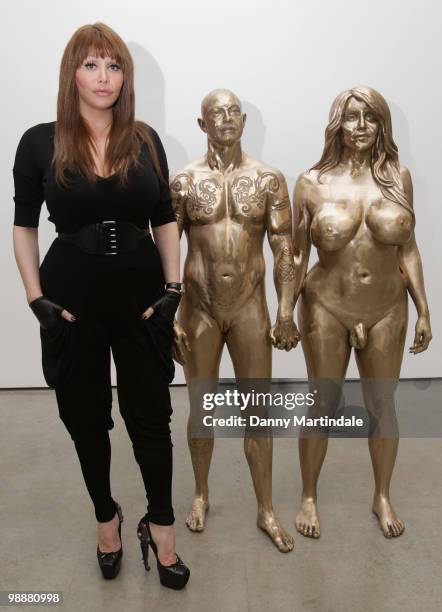 Marc Quinn model Allanah Starr poses with his sculpture 'Buck & Allanah' at photocall for Marc Quinn's new exhibition 'Allanah, Buck, Catman,...