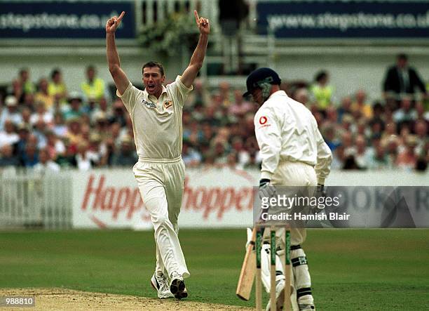 Glenn McGrath of Australia celebrates the wicket of Craig White of England on the first day of the Npower Third Test Match between England and...