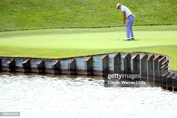 Justin Thomas of The USA putts on the 1st hole during day four of the HNA Open de France at Le Golf National on July 1, 2018 in Paris, France.