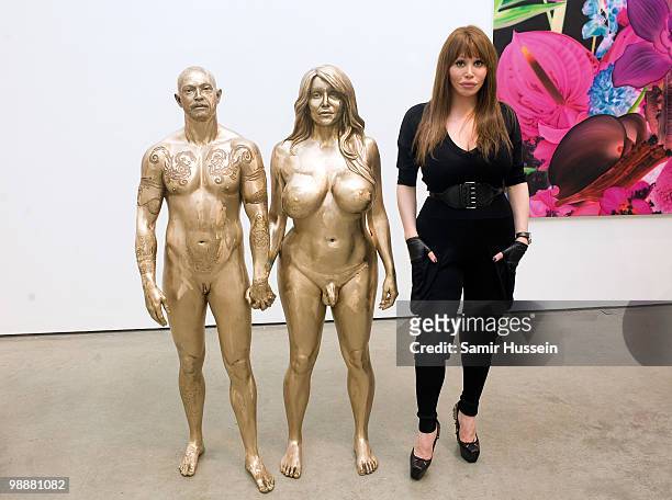 Model Allanah Starr poses with one the sculptures by artist Marc Quinn she posed for at his new exhibition 'Marc Quinn: Allanah, Buck, Catman,...