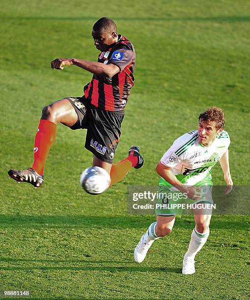Saint-Etienne forward Gonzalo Ruben Bergessio vies with Boulogne defender Bakary Soumare during their French L1 football match Boulogne-sur-Mer vs...