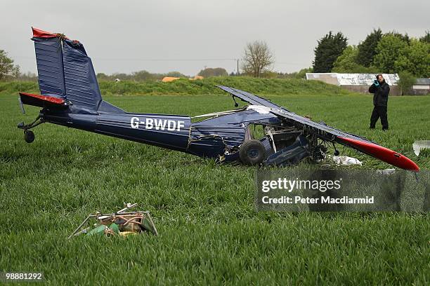 Light aircraft lies in a field at Hinton Airfield after crashing on May 6, 2010 in Brackley, England. The aircraft was carrying United Kingdom...