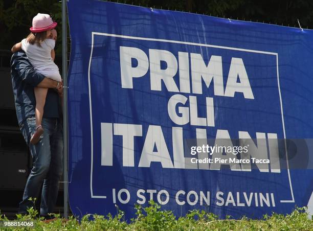 Matteo Salvini, Minister of Interior with with his daughter in his arms attends the Lega Nord Meeting on July 1, 2018 in Pontida, Bergamo, Italy.The...