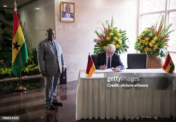 German President Frank-Walter Steinmeier signs the guest book under the presence of the president of the Republic of Ghana, Nana Akufo-Addo at...