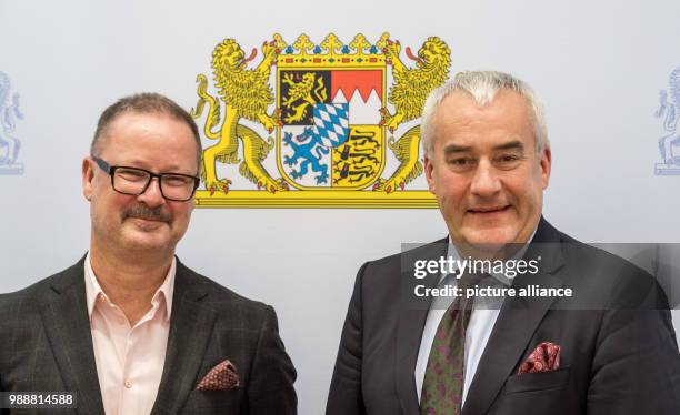 Bavaria's minister of culture Ludwig Spaenle introduces the new intendant of Munich's Residenz Theatre, Andreas Beck, in Munich, Germany, 12 December...