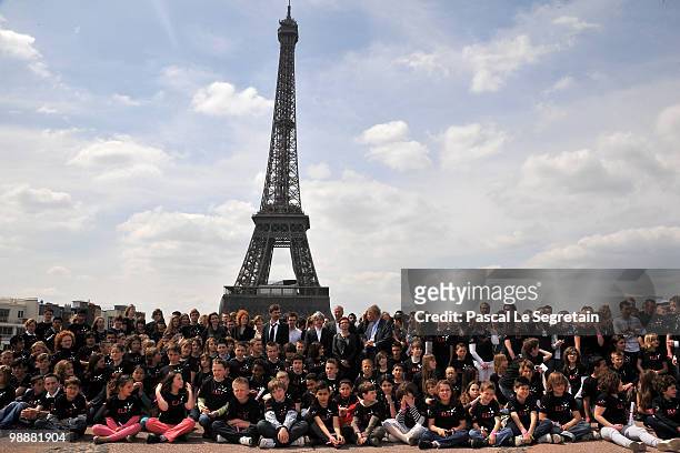 Zinedine Zidane poses with "ELA" association members at Musee du Quai Branly on May 6, 2010 in Paris, France.