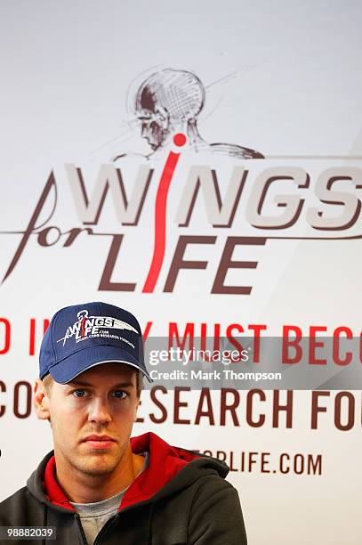 Sebastian Vettel of Germany and Red Bull Racing appears at an event supporting the Wings for Life charity during previews to the Spanish Formula One...