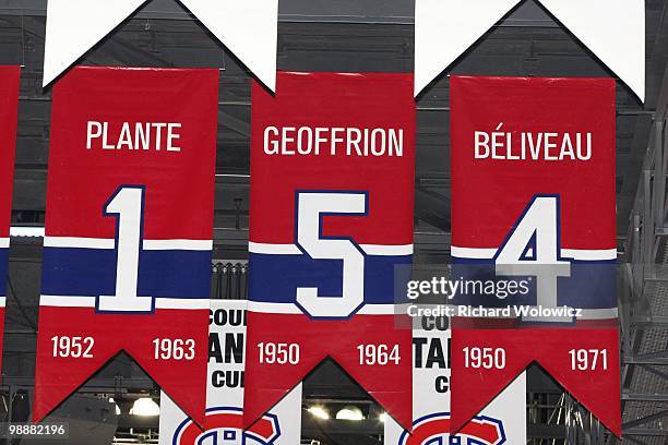 Photo of the banners commemorating the retired jerseys of Jacque Plante, Bernard Geoffrion and Jean Beliveau hanging in the Bell Centre prior to Game...