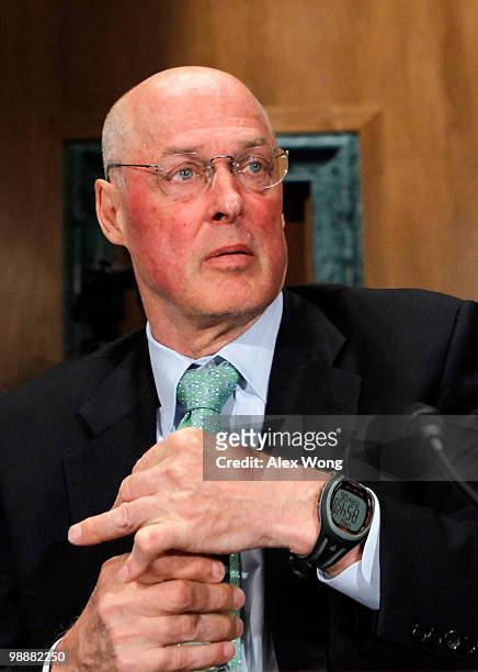 Former U.S. Treasury Secretary Henry Paulson waits for the beginning of a hearing before the Financial Crisis Inquiry Commission May 6, 2010 on...