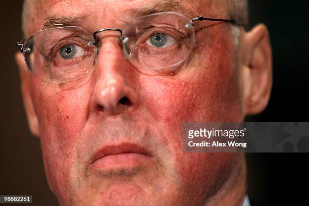 Former U.S. Treasury Secretary Henry Paulson pauses during a hearing before the Financial Crisis Inquiry Commission May 6, 2010 on Capitol Hill in...