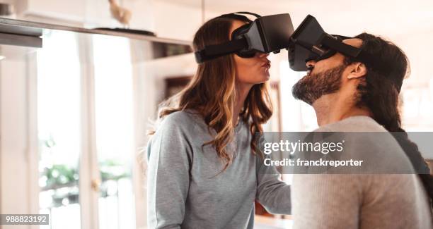 couple dancing with the vr headset - loving 2016 film stock pictures, royalty-free photos & images