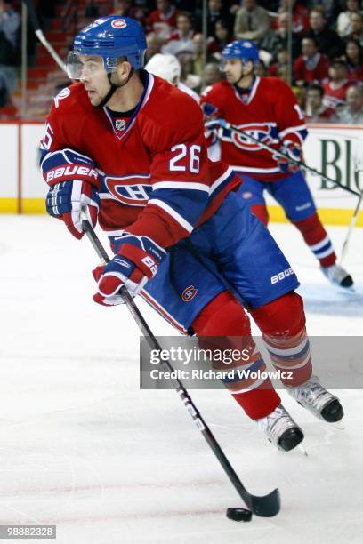 Josh Gorges of the Montreal Canadiens skates with the puck in Game Three of the Eastern Conference Quarterfinals against the Washington Capitals...
