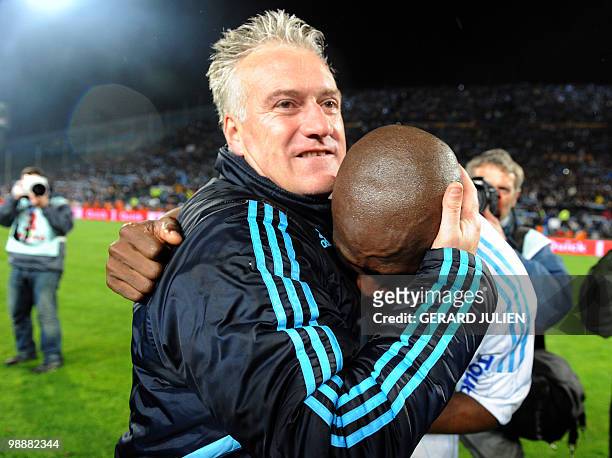 Marseille's coach Didier Deschamps and Cameroonian midfielder Stephane M'Bia celebrate at the end of the French L1 football match Marseille vs....