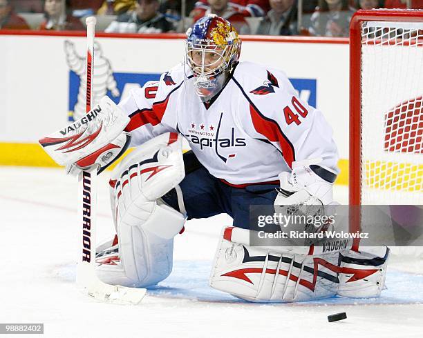 Semyon Varlamov of the Washington Capitals watches the rebounding puck in Game Three of the Eastern Conference Quarterfinals against the Montreal...