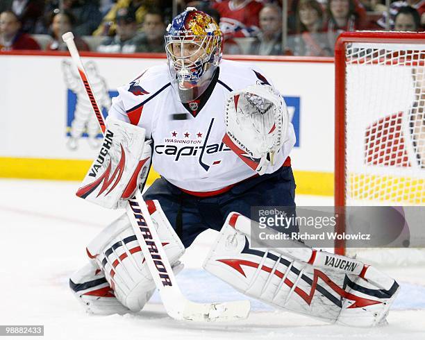 Semyon Varlamov of the Washington Capitals stops the incoming puck in Game Three of the Eastern Conference Quarterfinals against the Montreal...