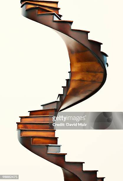 wooden spiral stair case - spiral staircase fotografías e imágenes de stock