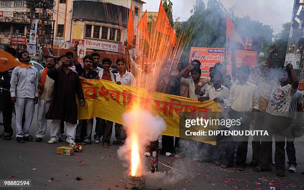 Viswa Hindu Parishad supporters celebrate the death sentence of Mohammed Ajmal Amir Kasab in Allahabad on May 6, 2010. The lone surviving gunman from...