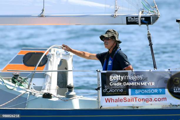 France's skipper Loic Lepage sails his boat "Laaland" sets sail from Les Sables d'Olonne Harbour on July 1 at the start of the solo around-the-world...