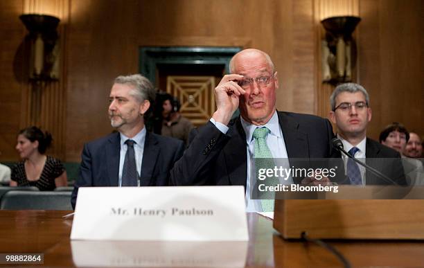 Henry Paulson, former U.S. Treasury secretary, arrives to speak during a Financial Crisis Inquiry Commission hearing on shadow banking in Washington,...