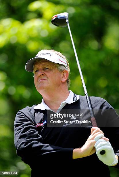 Ryder Cup captain Colin Montgomerie of Scotland plays his tee shot on the fourth hole during the first round of the BMW Italian Open at Royal Park I...