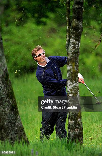 Nicolas Colsaerts of Belgium plays his approach shot on the 10th hole during the first round of the BMW Italian Open at Royal Park I Roveri on May 6,...