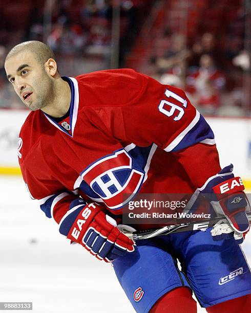 Scott Gomez of the Montreal Canadiens skates during the warm up period prior to facing the Washington Capitals in Game Four of the Eastern Conference...