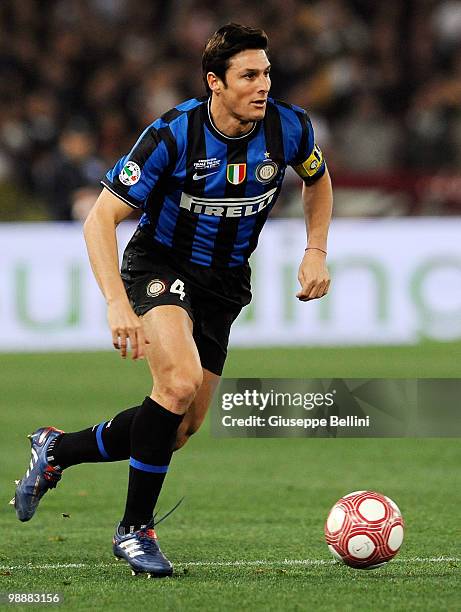 Javier Zanetti of Inter runs with the ball during the match the Tim Cup between FC Internazionale Milano and AS Roma at Stadio Olimpico on May 5,...