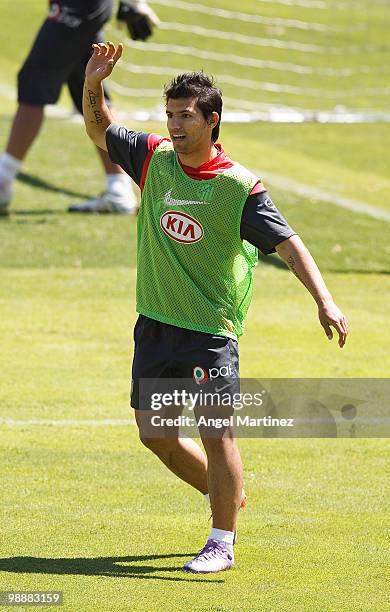 Sergio Aguero of Atletico Madrid gestures during a training session held ahead of next week's Europa League Final at Vicente Calderon Stadium on May...