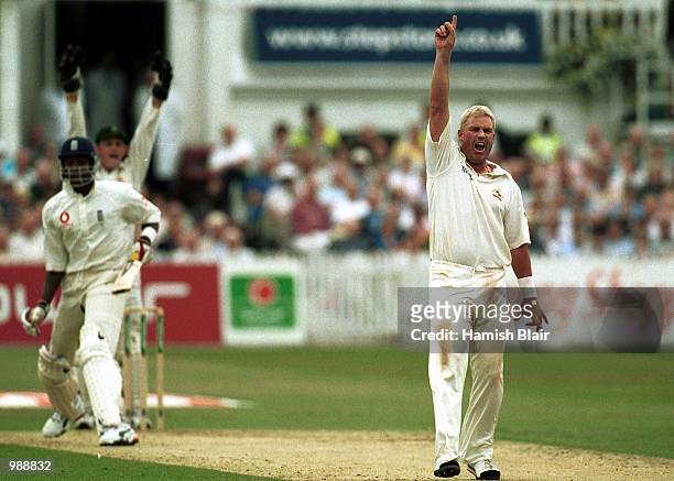 Shane Warne of Australia celebrates trapping Alex Tudor of England leg before wicket during the first day of the Npower Third Test match between...