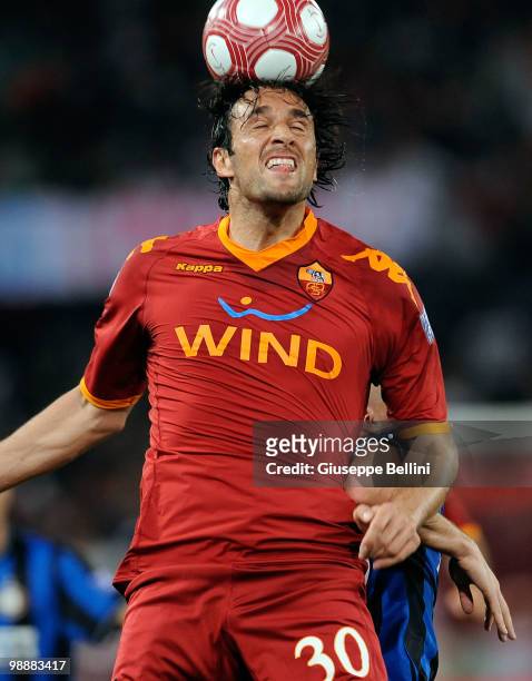 Luca Toni of Roma heads the ball during the Tim Cup match between FC Internazionale Milano and AS Roma at Stadio Olimpico on May 5, 2010 in Rome,...