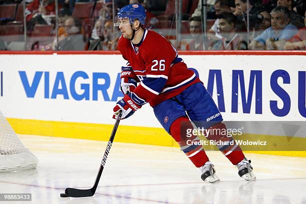 Josh Gorges of the Montreal Canadiens skates with the puck in Game Four of the Eastern Conference Quarterfinals against the Washington Capitals...