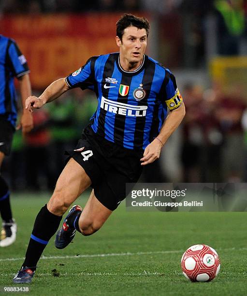 Javier Zanetti of Inter runs with the ball during the match the Tim Cup between FC Internazionale Milano and AS Roma at Stadio Olimpico on May 5,...