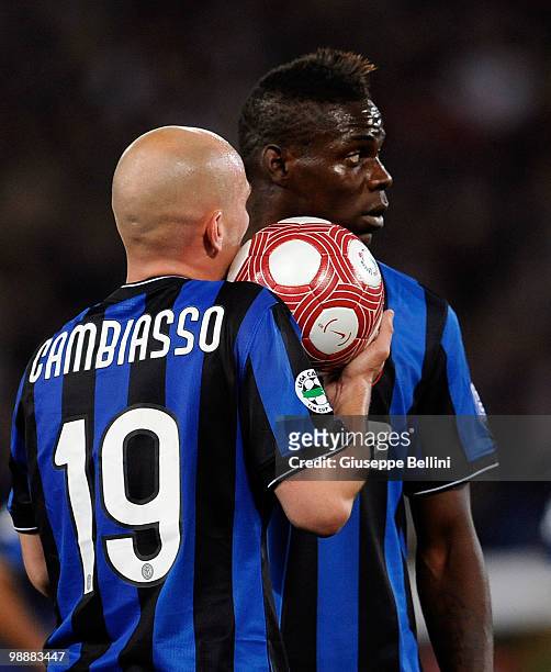 Esteban Cambiasso and Mario Balotelli of Inter in action during the match the Tim Cup between FC Internazionale Milano and AS Roma at Stadio Olimpico...