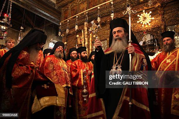 Greek Orthodox Patriarch of Jerusalem Theophilos III leads a mass in the Church of the Nativity, believed by Christians to be the birth place of...