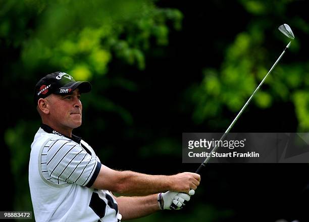 Thomas Bjorn of Denmark plays his tee shot on the fourth hole during the first round of the BMW Italian Open at Royal Park I Roveri on May 6, 2010 in...