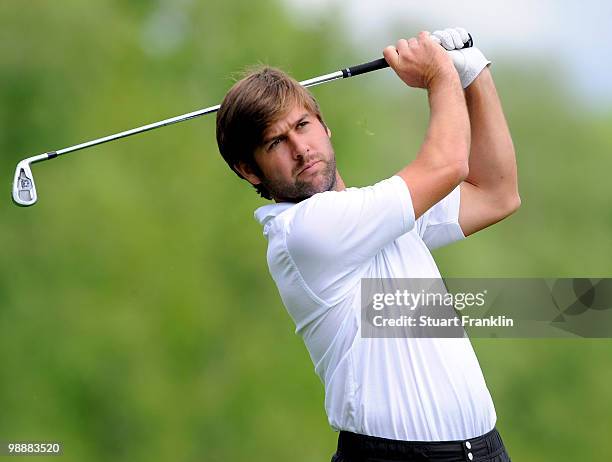 Robert Rock of England plays his approach shot on the 13th hole during the first round of the BMW Italian Open at Royal Park I Roveri on May 6, 2010...