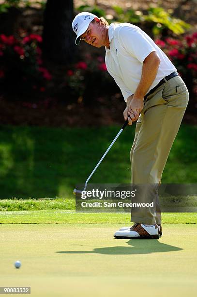 Ernie Els of South Africa putts on the 13th green during the first round of THE PLAYERS Championship held at THE PLAYERS Stadium course at TPC...