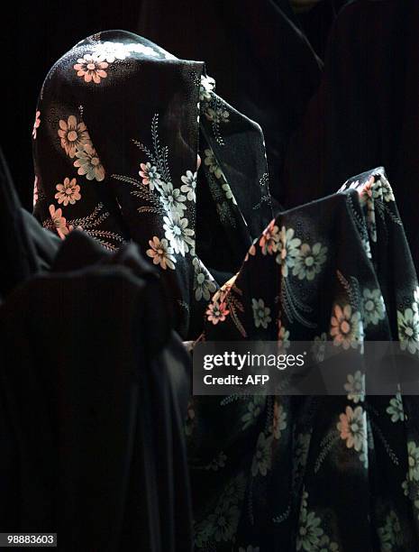 Shiite Muslim women take part in Friday noon prayers in the holy city of Karbala, 110kms from the capital Baghdad on January 08, 2010. Shiite Muslims...