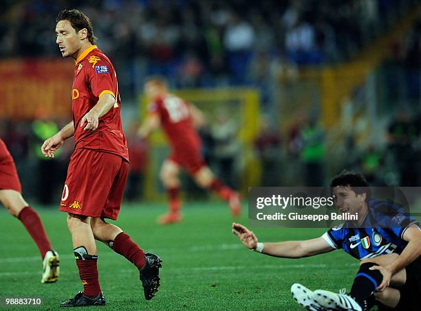 Francesco Totti of Roma and Diego Milito of Inter in action during the match the Tim Cup between FC Internazionale Milano and AS Roma at Stadio...