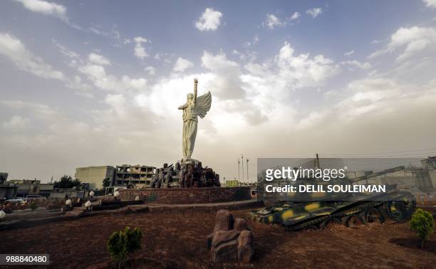 Picture taken on May 27, 2018 shows a view of the Kurdish resistance monument , a statue dedicated to the female fighters who fought for the...