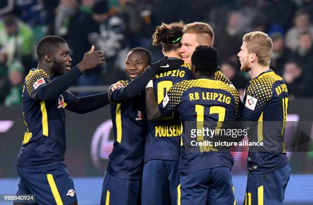 Leipzig's Marcel Halstenberg celebrates his 1-1 goal with Timo Werner , Bruma , Yussuf Poulsen , Naby Keita and Dayot Upamecano during the German...