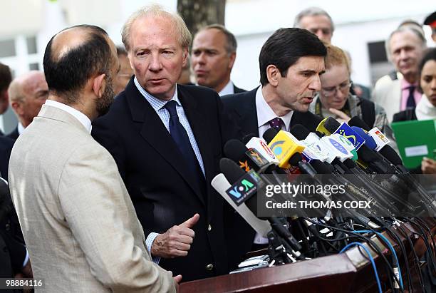 French Interior Minister Brice Hortefeux chats with his Afghan counterpart Hanif Atmar during a press conference in Kabul on May 6, 2010. Hortefeux...