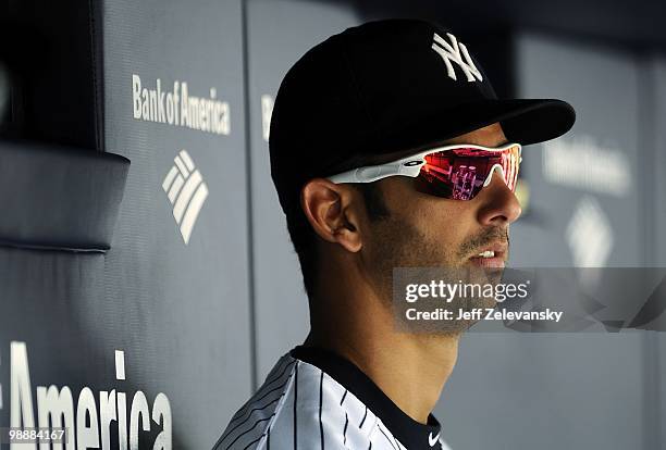 Jorge Posada of the New York Yankees sits in the dugout against the Baltimore Orioles at Yankee Stadium on May 5, 2010 in the Bronx borough of New...