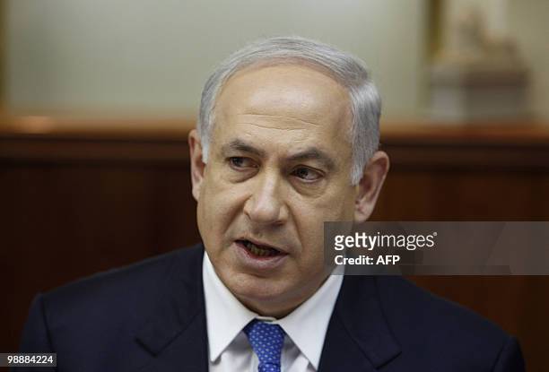 Israel's Prime Minister Benjamin Netanyahu attends the weekly cabinet meeting at his office in Jerusalem on January 10, 2010. Palestinian medical...