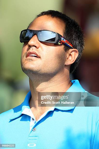 Driver Juan Pablo Montoya watches the play of Camilo Villegas during the first round of THE PLAYERS Championship held at THE PLAYERS Stadium course...