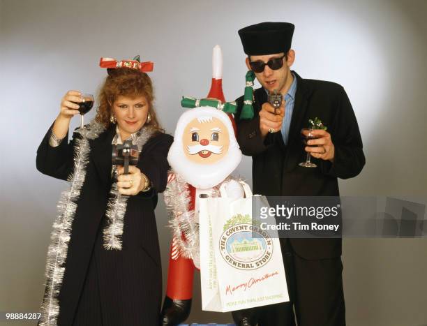 Singers Kirsty MacColl and Shane MacGowan with with toy guns and an inflatable Santa in a festive scenario, circa 1987. In 1987, the pair...