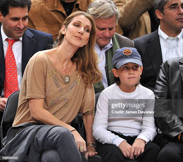 Celine Dion and son Rene Charles Angelil attend the Portland Trailblazers Vs. New York Knicks game at Madison Square Garden on December 7, 2009 in...