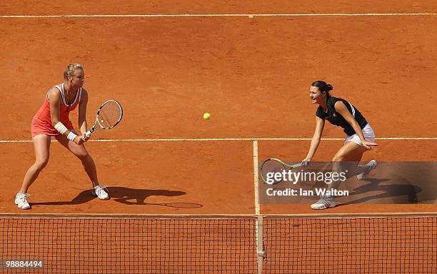 Vera Dushevina of Russia and Klaudia Jans of Poland in action against Kveta Peschke of the Czech Republic and Katarina Srebotnik of Slovakia during...